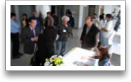 At the reception desk (L-R), X. Gu, K. Clowes, S. Mikhail, T. Hong.